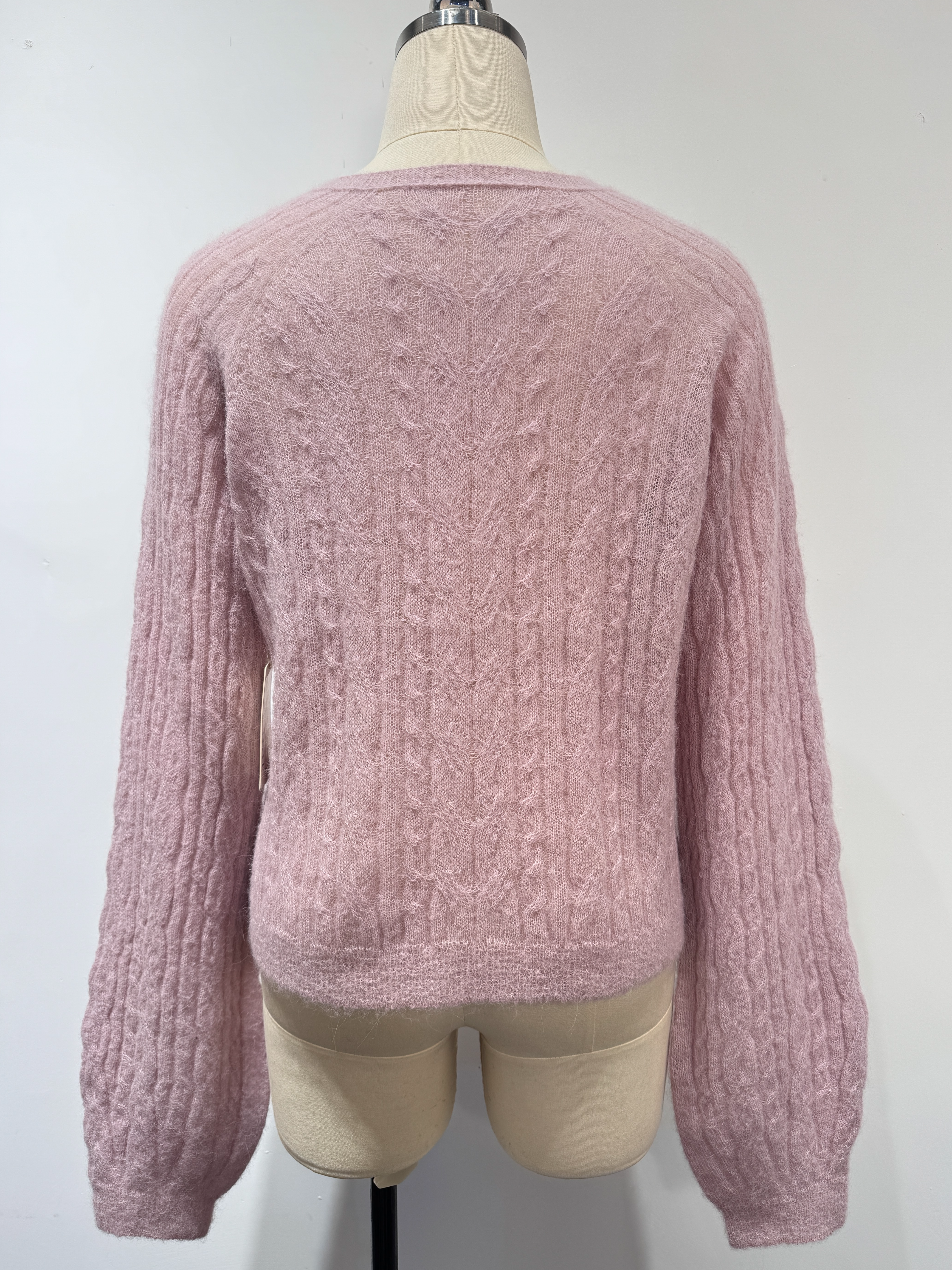 Pull sans couture en maille torsad&eacute;e